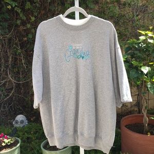 MC SPORTWEAR,Lite gray Sweatshirt W/ saying .